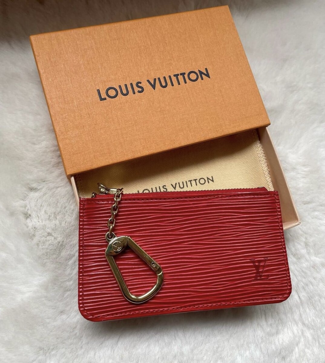 Key pouch leather small bag Louis Vuitton Red in Leather - 26457326