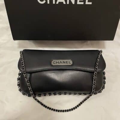 CHANEL Vintage Lambskin Logo Pochette Shoulder Bag in Black.