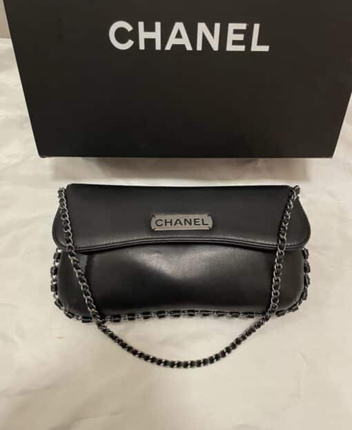 CHANEL Vintage Lambskin Logo Pochette Shoulder Bag in Black.