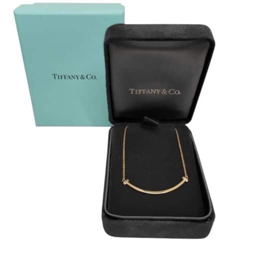 TIFFANY 18K Gold Small T Smile Pendant Necklace.
