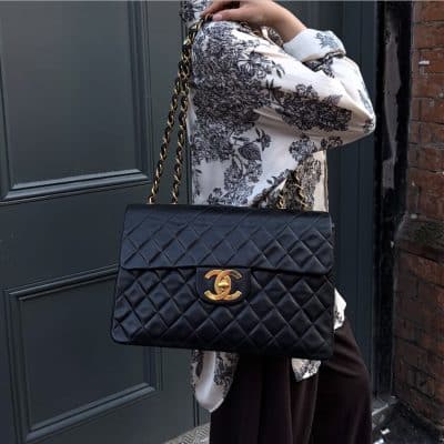 Chanel 1990s Maxi Jumbo Quilted Leather Shoulder Crosbody Bag in Black.